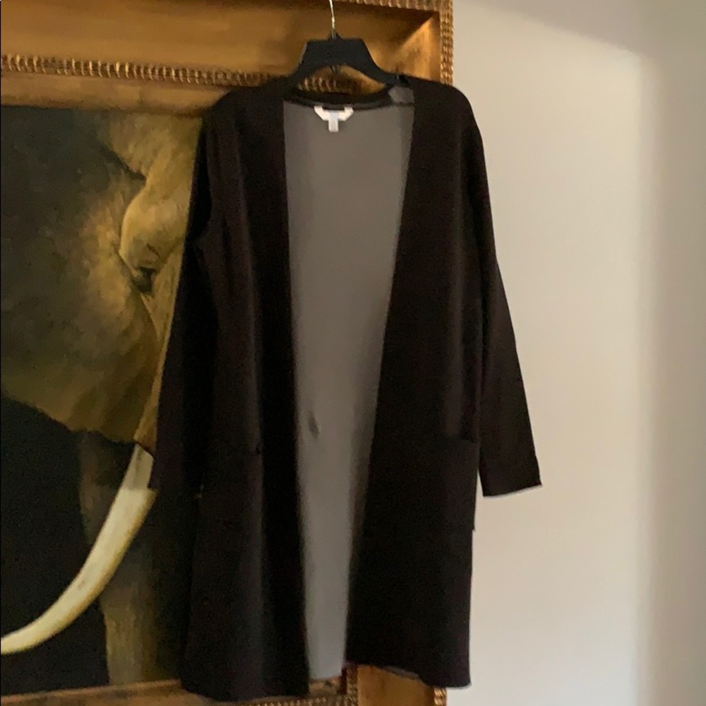 Black, long sleeved cardigan.